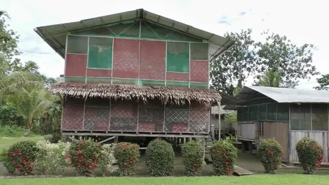 34 The water tanks are at the back of this two story building